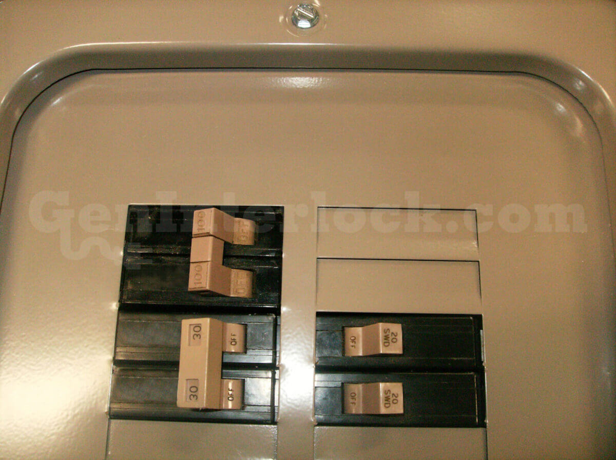 Eaton Cutler-Hammer 21701 CH Series Generator Interlock Kit Installed on Panel with Tan Handle Breakers