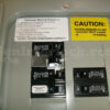 Eaton Cutler-Hammer 21601 Generator Interlock Kit Installed on Panel with Caution and Start-Up Labels