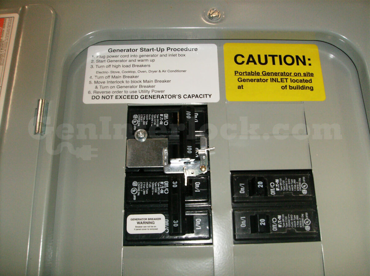 Eaton Cutler-Hammer 21601 Generator Interlock Kit Installed on Panel with Caution and Start-Up Labels