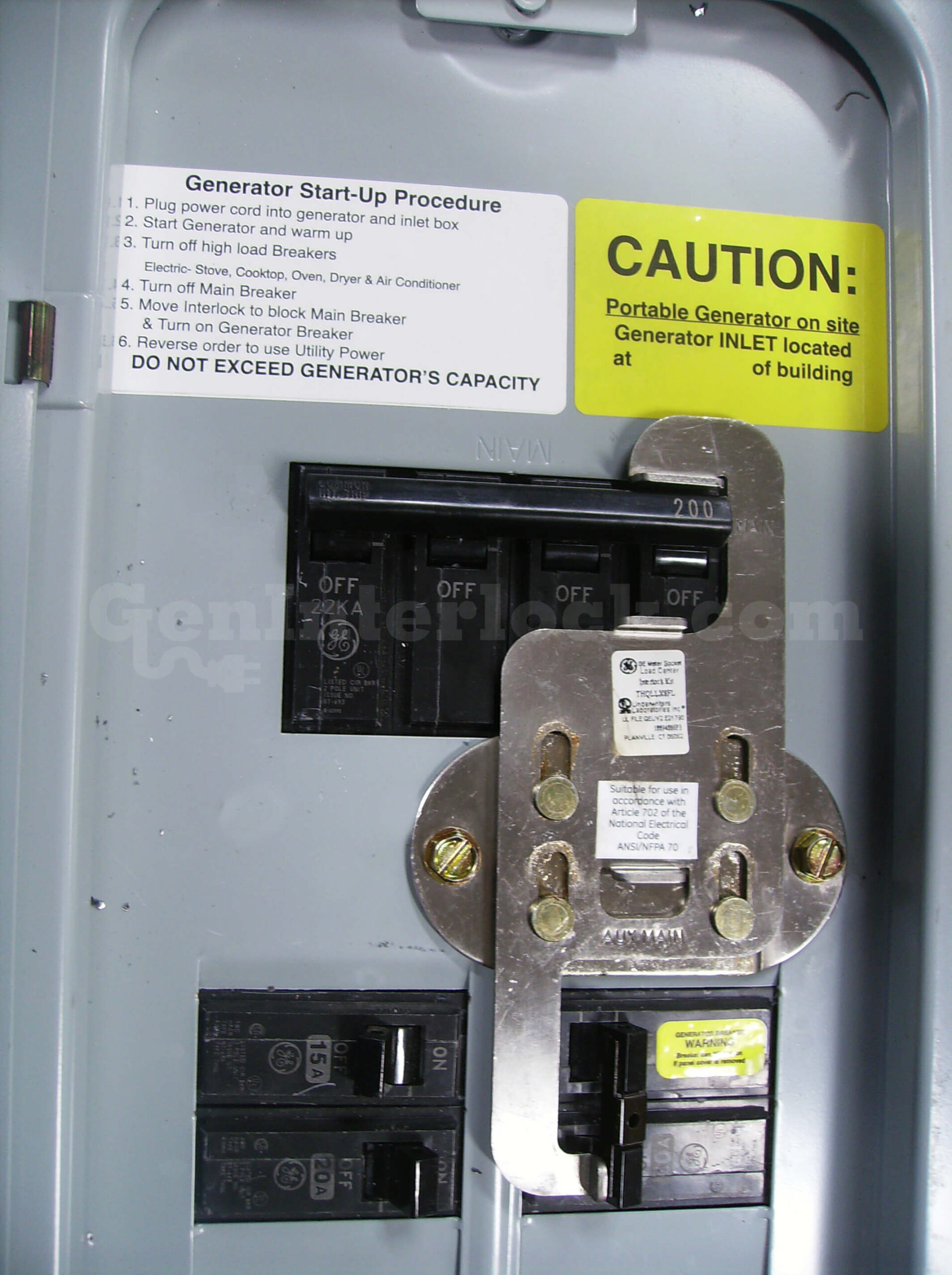GE 31602 Vertical Throw Generator Interlock Kit (formerly GE200HDUL) - Installed on Panel with Start-Up and Caution Labels