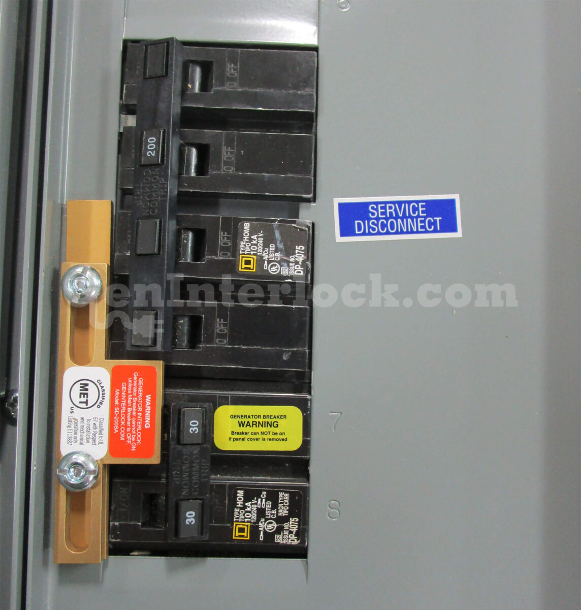 Square D Homeline 51202 Meter Main Generator Interlock Kit - Installed on Panel Showing Service Disconnect Label