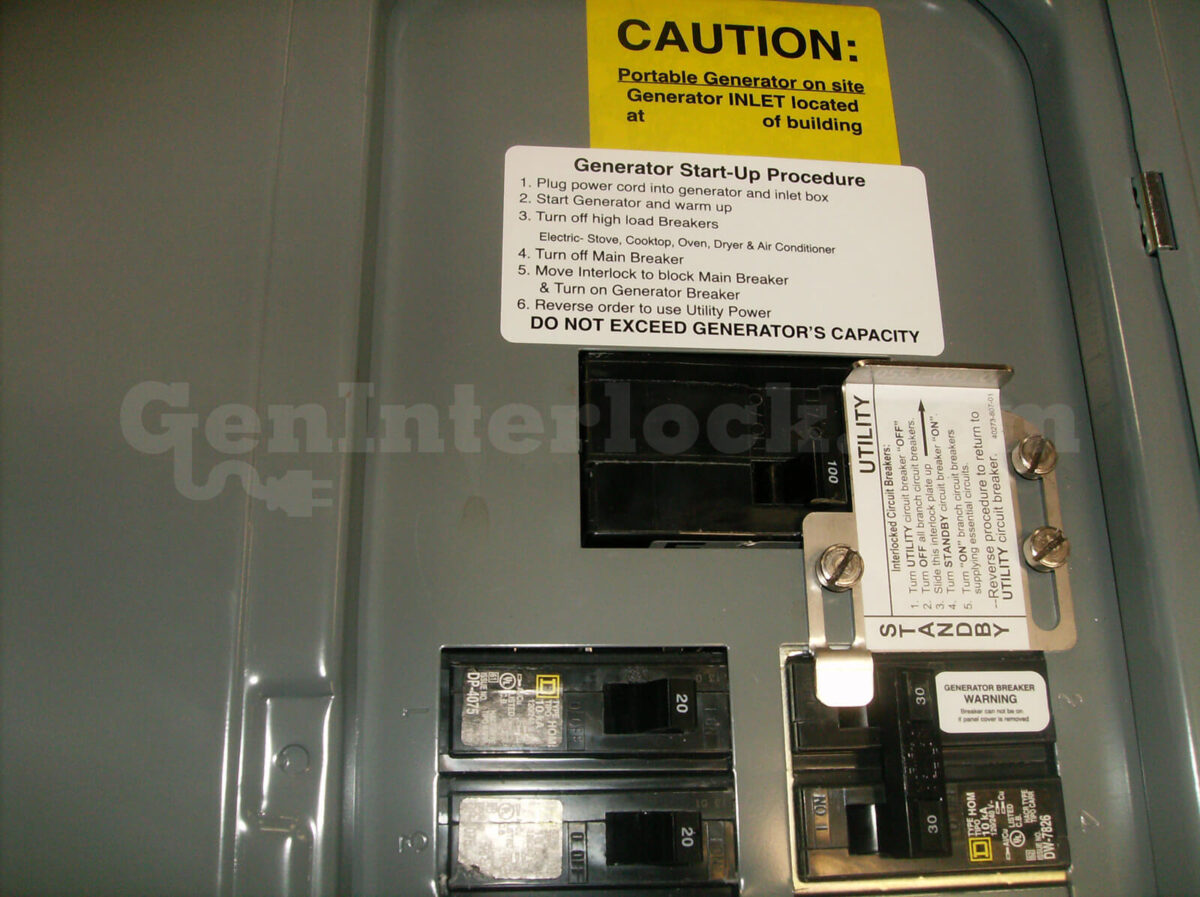 Square D Homeline 51601 Generator Interlock Kit Installed on Breaker Panel with Caution Labels