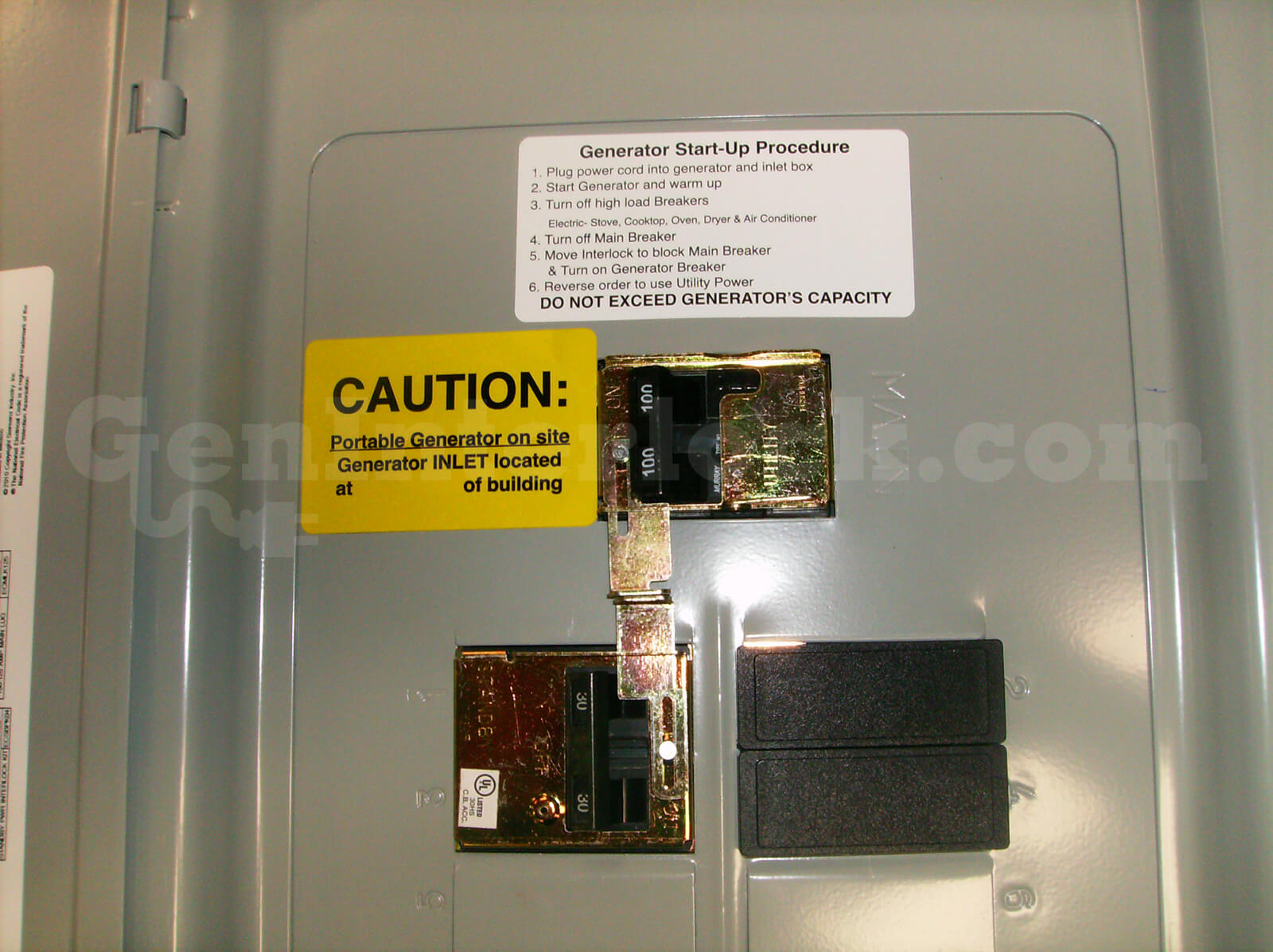 Siemens 41601 Generator Interlock Kit for Murray 100A - Installed on Panel with Safety Labels Visible