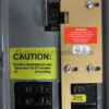 Square D 51203 Generator Interlock Kit - Installed on Panel with Warning and Caution labels visible
