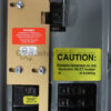 Square D 51208 Generator Interlock Kit Installed on Breaker Panel with Caution Label