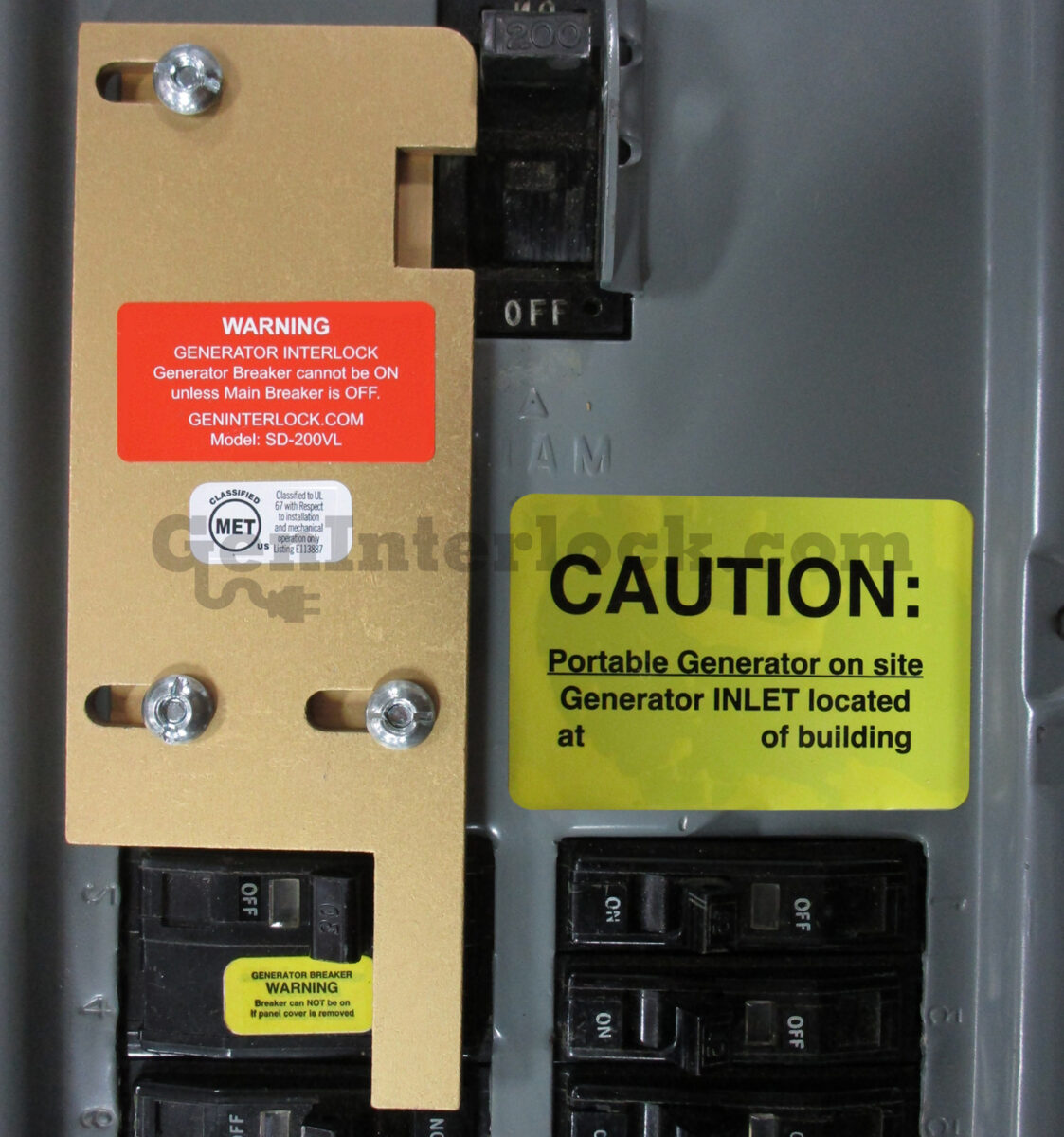 Square D 51208 Generator Interlock Kit Installed on Breaker Panel with Caution Label