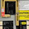 Westinghouse 15502 Generator Interlock Kit - Installed on Breaker Panel with caution labels visible