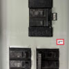 GE 31104 Generator Interlock Kit - Installed on 100A Main in 200 Amp Panel Showing 2-1/4 Inch Spacing