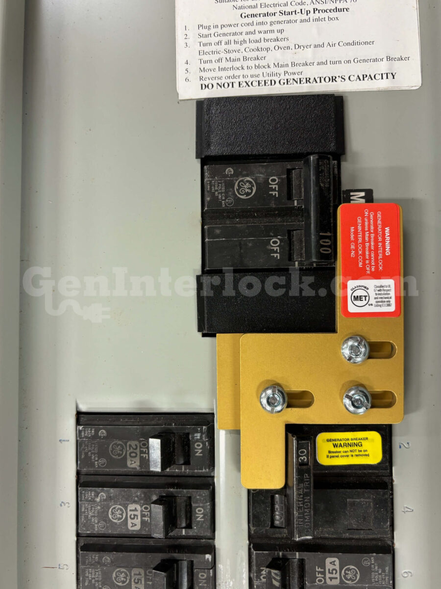 GE 31104 Generator Interlock Kit - Installed on Panel with Main Breaker On and MET Label Visible