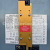 Square D 51301 Generator Interlock Kit Installed on Breaker Panel with Warning Label